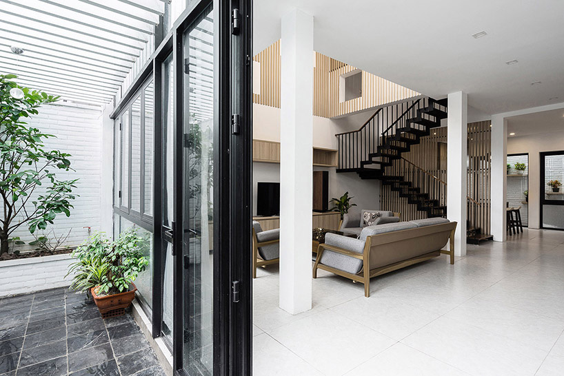 DANstudio-TH-house-tree-balconies-hanoi-vietnam-designboom-04